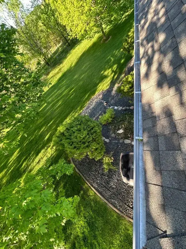 Gutter cleaning project in Delano, MN